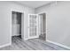 Hallway with white trim and doors including a french door leading to other rooms in the home at 3860 Overlake Dr, Cumming, GA 30041