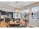Open-concept living room and kitchen with modern appliances and a cozy atmosphere at 3860 Overlake Dr, Cumming, GA 30041
