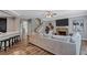 Spacious living room featuring a fireplace, staircase, and open floor plan at 3860 Overlake Dr, Cumming, GA 30041