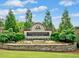 Community entrance sign for the Chattahoochee River Club surrounded by manicured landscaping at 3860 Overlake Dr, Cumming, GA 30041