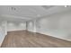 Open basement space features wood look floors and recessed lighting at 4735 Julian Way, Acworth, GA 30101