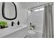 Modern bathroom features a sleek vanity, new fixtures, and a shower with tile surround at 4735 Julian Way, Acworth, GA 30101
