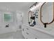 Bright bathroom features a shower, soaking tub, modern vanity and updated lighting at 4735 Julian Way, Acworth, GA 30101