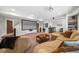 Finished basement with large screen, bar, comfortable seating and carpeted floors at 7049 Bennington Ln, Cumming, GA 30041