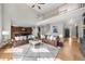 Open-concept living room with views of the second floor and an open floor plan at 7049 Bennington Ln, Cumming, GA 30041