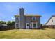 The home has a large back yard that is fully fenced at 1932 Sawgrass Dr, Hampton, GA 30228