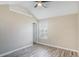 Well-lit bedroom with neutral walls, wood-look flooring and standard window at 1932 Sawgrass Dr, Hampton, GA 30228