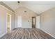 Bright main bedroom featuring vaulted ceilings with access to an en suite bathroom and closet at 1932 Sawgrass Dr, Hampton, GA 30228