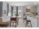 Contemporary eat-in kitchen with stainless steel appliances and gray cabinets at 227 Ivey Ter, Temple, GA 30179