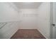 Walk-in closet with wire shelving at 2557 Woodford Ln, Buford, GA 30519