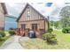 Backyard with grass, path, grill and an exterior view of the home at 3044 Dogwood Dr, Atlanta, GA 30354