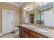 Bathroom boasts double sinks, granite countertops, and tile floors at 3044 Dogwood Dr, Atlanta, GA 30354