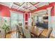 Spacious dining area with hardwood floors that seamlessly transitions into the living room at 3044 Dogwood Dr, Atlanta, GA 30354