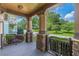 Covered front porch with stone columns and trim, offering a pleasant outdoor space at 3044 Dogwood Dr, Atlanta, GA 30354