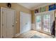 Hallway with access to closets, laundry room, and backyard deck at 3044 Dogwood Dr, Atlanta, GA 30354