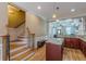 Open kitchen and living area with hardwood floors and granite countertops at 3044 Dogwood Dr, Atlanta, GA 30354