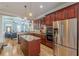 Modern kitchen with stainless steel appliances, granite countertops, and a center island at 3044 Dogwood Dr, Atlanta, GA 30354