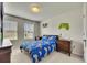 Cozy bedroom with a game-themed decor, perfect for a young gamer at 165 Brookstone E Park, Acworth, GA 30101