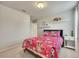 Bright bedroom with fun themed bedding, neutral walls, and white accents at 165 Brookstone E Park, Acworth, GA 30101