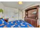 Bedroom featuring dark wood furniture and playful video game themed decor at 165 Brookstone E Park, Acworth, GA 30101