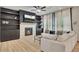 Inviting living room with built-in shelves, a fireplace, and a comfortable white sofa at 165 Brookstone E Park, Acworth, GA 30101