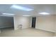 Finished basement space, featuring carpeting, lights, and a heater for a variety of activities at 1669 Azalea Dr, Lawrenceville, GA 30043