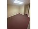 A versatile basement space features carpet and a door for easy access at 1669 Azalea Dr, Lawrenceville, GA 30043