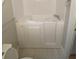 Accessible bathroom featuring a walk-in tub for safety and convenience at 1669 Azalea Dr, Lawrenceville, GA 30043