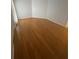 An inviting bedroom boasts gleaming hardwood floors and soft, neutral wall paint at 1669 Azalea Dr, Lawrenceville, GA 30043