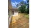 Wooden deck overlooking the backyard provides space for relaxation at 1669 Azalea Dr, Lawrenceville, GA 30043