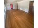 Bright living room boasts hardwood floors and recessed lighting at 1669 Azalea Dr, Lawrenceville, GA 30043