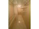 Spacious walk-in closet with wire shelving and tile flooring for organized storage solutions at 1669 Azalea Dr, Lawrenceville, GA 30043