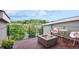 Balcony featuring a modern fire pit, tiled flooring, and an open view of the surrounding landscape at 1672 Dekalb Ne Ave # 2, Atlanta, GA 30307