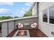 Balcony with a fire pit and seating, offering views of the neighborhood and sky for outdoor relaxation at 1672 Dekalb Ne Ave # 2, Atlanta, GA 30307