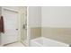 Modern bathroom with shower and tub combination, complemented by neutral tile at 1672 Dekalb Ne Ave # 2, Atlanta, GA 30307