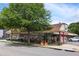 Charming storefront with outdoor seating area and colorful bicycle parked out front at 1672 Dekalb Ne Ave # 2, Atlanta, GA 30307