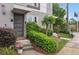 Modern townhome featuring manicured landscaping and a contemporary front door with frosted glass panes at 1672 Dekalb Ne Ave # 2, Atlanta, GA 30307