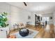 Open concept living room boasts hardwood floors and stylish furnishings at 1672 Dekalb Ne Ave # 2, Atlanta, GA 30307