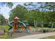 Large community playground offers slides, play structures, and shaded picnic areas for Gathering enjoyment at 1672 Dekalb Ne Ave # 2, Atlanta, GA 30307