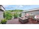 Roof deck with a fire pit, chairs, and views of the surrounding neighborhood at 1672 Dekalb Ne Ave # 2, Atlanta, GA 30307