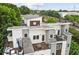 The modern rooftop showcases an inviting lounge area with stylish furniture and a view of the train tracks at 1672 Dekalb Ne Ave # 2, Atlanta, GA 30307