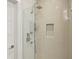 Shower with glass doors, modern fixtures, and neutral tile design at 1672 Dekalb Ne Ave # 2, Atlanta, GA 30307