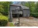 Exterior view of a home with a basketball court and patio at 270 Shady Marsh Trl, Roswell, GA 30075