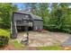 Backyard with a basketball court and mature trees at 270 Shady Marsh Trl, Roswell, GA 30075