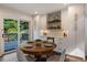 The dining area is conveniently located near a sliding glass door leading to the deck, perfect for outdoor dining at 270 Shady Marsh Trl, Roswell, GA 30075