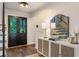 Inviting entryway with dark wood floors, modern light fixture, and stylish console table at 270 Shady Marsh Trl, Roswell, GA 30075