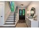 Welcoming entryway with modern staircase, stylish console table, and elegant lighting at 270 Shady Marsh Trl, Roswell, GA 30075