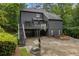 Backyard view showcasing a basketball court, stairs to the deck, and lush greenery at 270 Shady Marsh Trl, Roswell, GA 30075