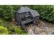 Two-story home with deck, landscaping and view of the basketball court in the rear at 270 Shady Marsh Trl, Roswell, GA 30075