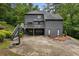 Charming two-story home with a two car garage, deck and a basketball court at 270 Shady Marsh Trl, Roswell, GA 30075